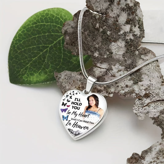 Personalized memorial pendant necklace featuring a heart shape, photo, and heartfelt message.