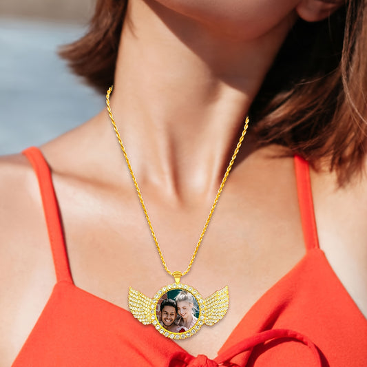 Personalized angel wings photo pendant on a woman, featuring a cherished photo and delicate angel wings design.