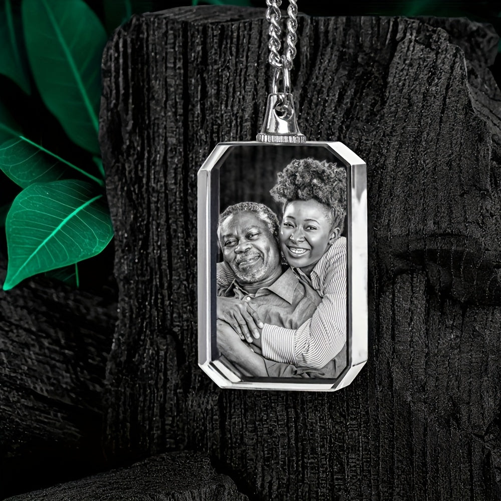 Personalized heart-shaped photo necklace featuring a loving couple's black and white photo, showcasing a meaningful keepsake.