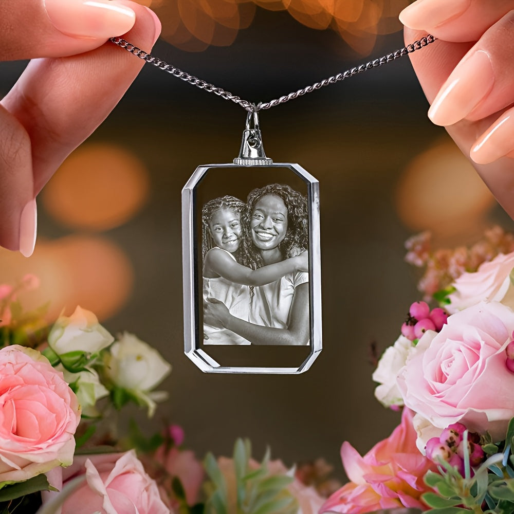 Personalized heart-shaped photo necklace featuring a cherished photo of two girls, surrounded by beautiful flowers.
