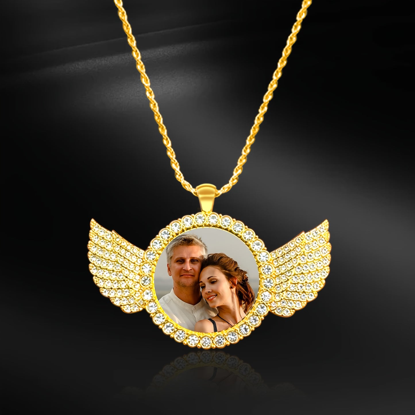 Personalized angel wings photo pendant featuring a couple's photo inside a sparkling winged frame.